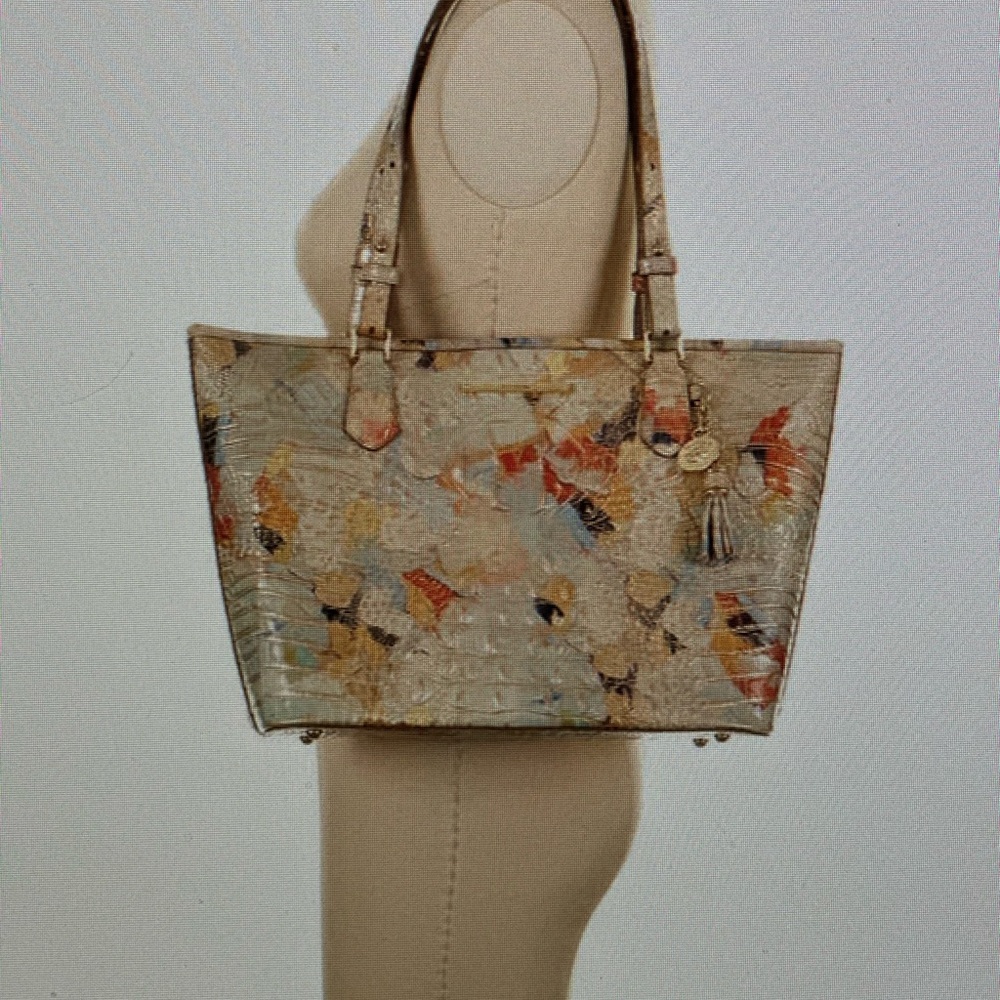 New with tags.  Comes with original dust bag.  Beautiful lightweight & roomy.